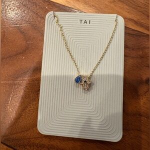 Tai Gold Necklace with Blue and Silver Charms